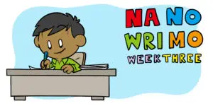 NaNoWriMo Week 3: How To Get Over The Hump (And More) - A young, adult author works at a desk.