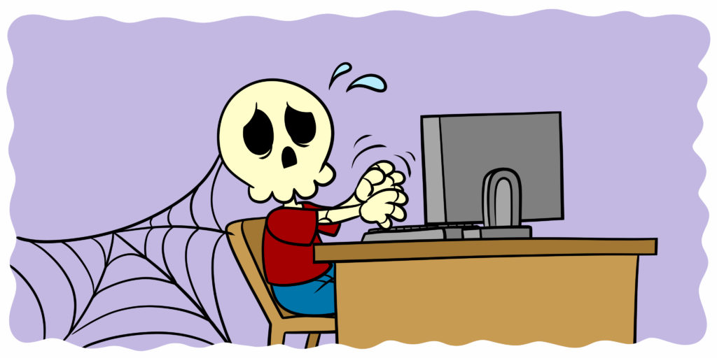 Are You A Binge Writer? Here’s How (And Why) To Stop - A skeleton sits at a desk, still typing.