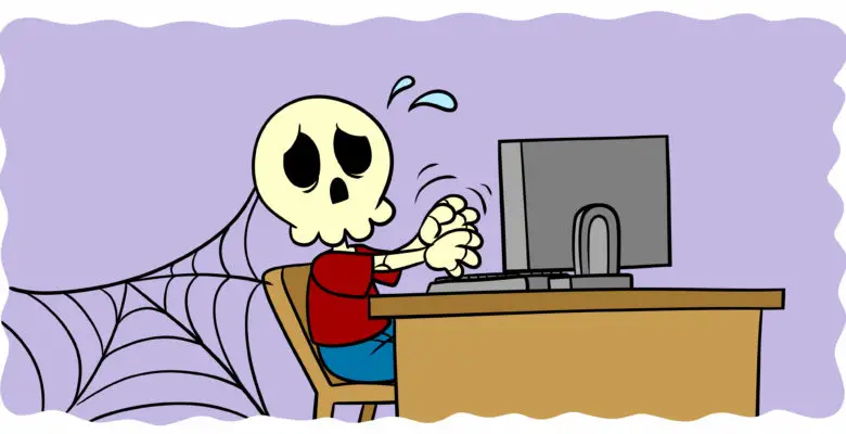 Are You A Binge Writer? Here’s How (And Why) To Stop - A skeleton sits at a desk, still typing.